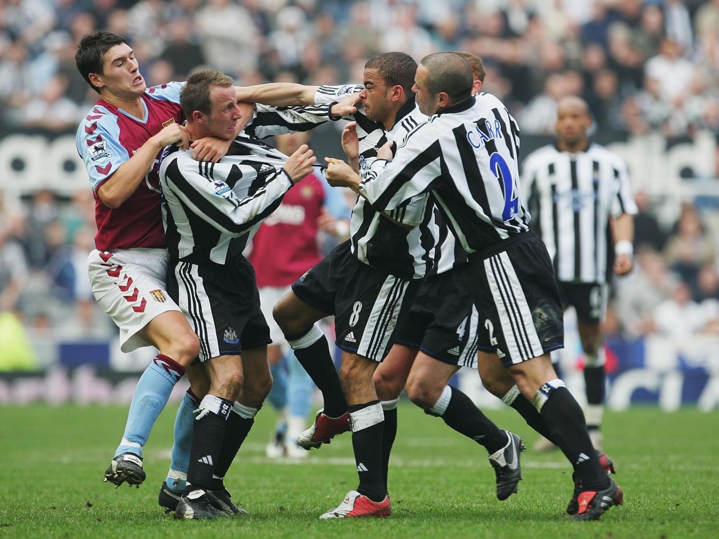 Newcastle United teammates Lee Bowyer and Kieron Dyer fighting during a match
