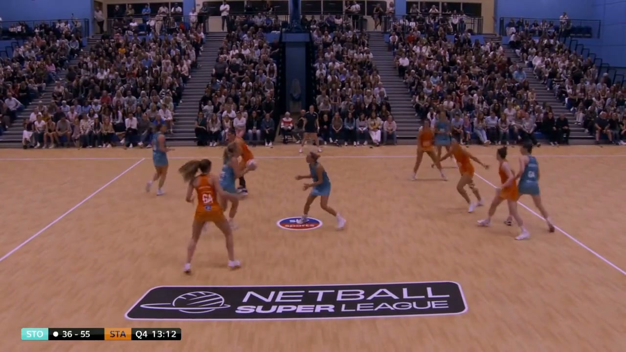 Full frame at the moment the WD catches the ball in the centre third