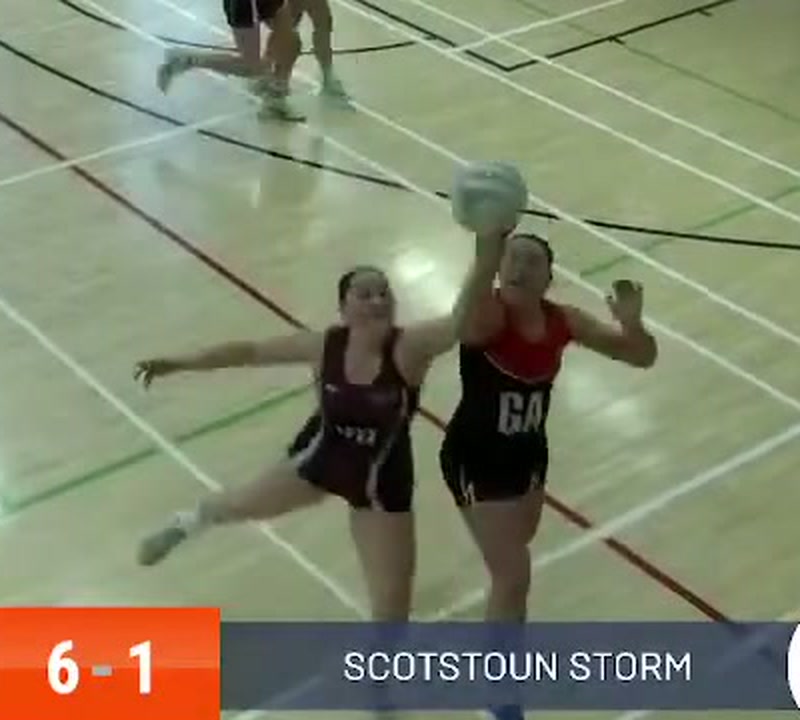 Zoomed view of the same frame, showing the WD and GA with their hands at the ball